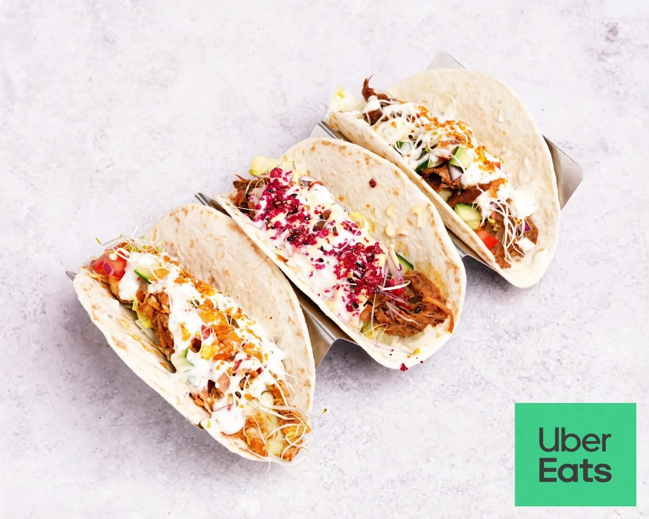 Trio tacos met verschillende toppings